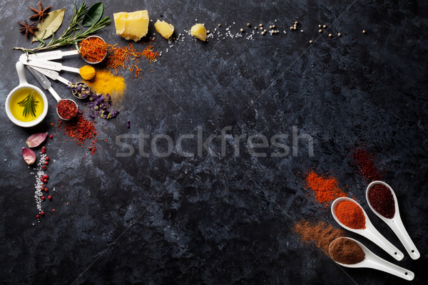 Herbs and spices over black stone Stock photo © karandaev