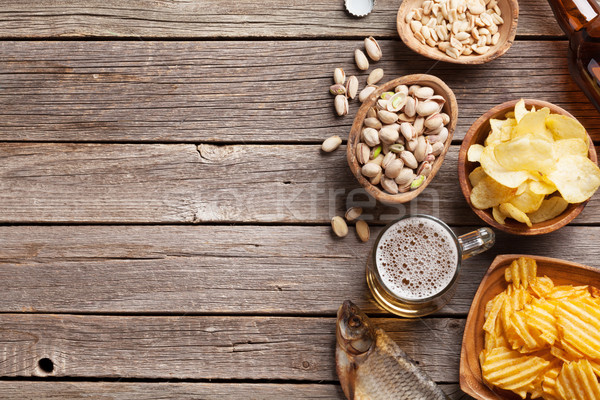 Stockfoto: Bier · snacks · mok · houten · tafel · noten