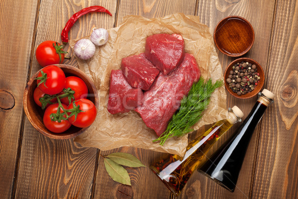 Ruw filet biefstuk specerijen houten tafel top Stockfoto © karandaev