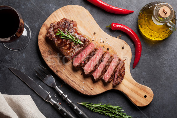 Grilled striploin steak and wine Stock photo © karandaev