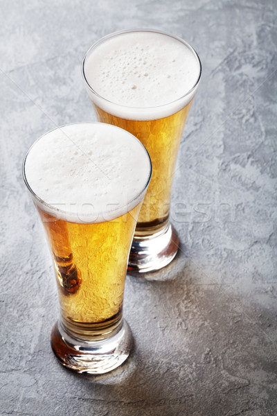 Dos cerveza gafas piedra mesa Foto stock © karandaev