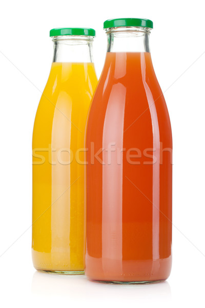 Narancs grapefruit dzsúz üvegek izolált fehér Stock fotó © karandaev