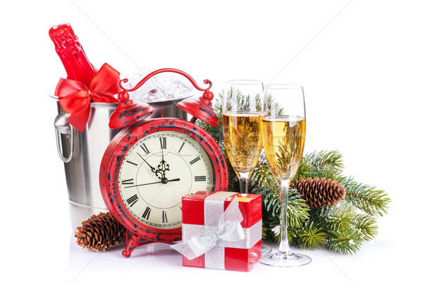 Champagne, gift boxes and christmas clock Stock photo © karandaev