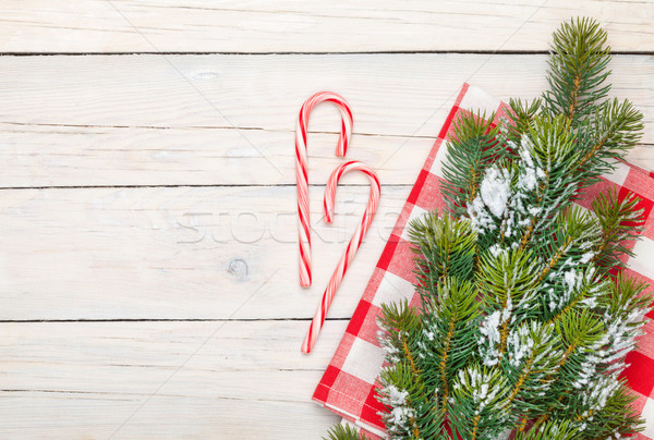 Karácsony cukorka sétapálca hó fenyőfa felülnézet Stock fotó © karandaev