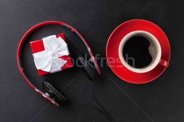 Gift box with headphones and coffee Stock photo © karandaev