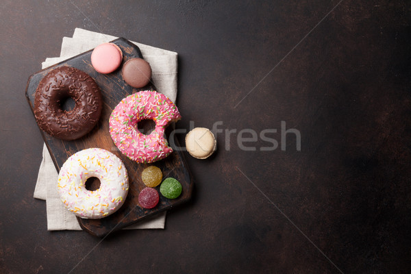 Colorful donuts and macaroons Stock photo © karandaev
