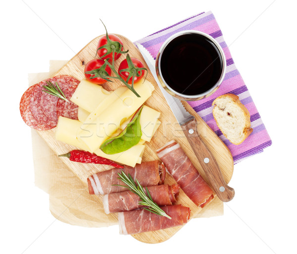 Stock photo: Red wine with cheese, prosciutto, bread, vegetables and spices