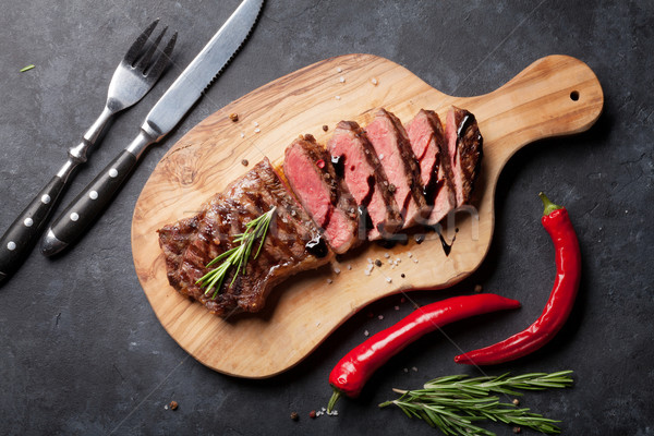 Grillés steak planche à découper pierre table [[stock_photo]] © karandaev