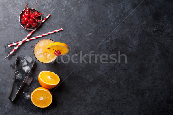 Tequila napfelkelte koktél sötét kő asztal Stock fotó © karandaev