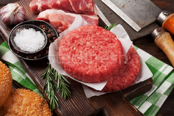 Raw minced beef meat and ingredients for burgers Stock photo © karandaev
