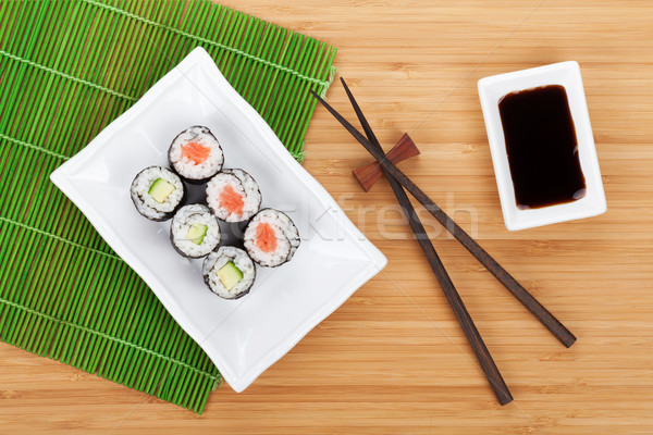 Sushi maki ayarlamak soya sosu bambu tablo Stok fotoğraf © karandaev