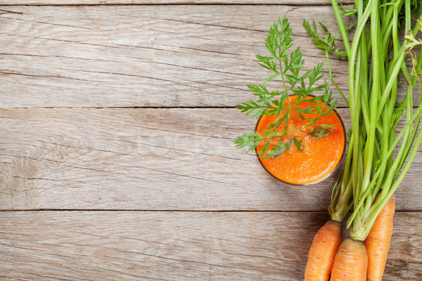 Fresh vegetable smoothie. Carrot juice Stock photo © karandaev