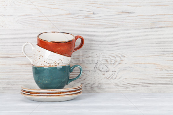 Kahve fincanları renkli ahşap duvar uzay ev Stok fotoğraf © karandaev