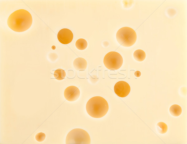Cheese background with heart shape holes Stock photo © karandaev