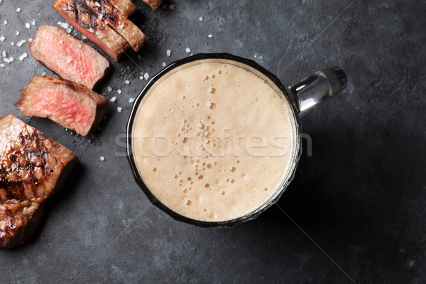 Grilled sliced beef steak and beer Stock photo © karandaev