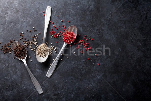 Colorato granello di pepe rosso bianco pepe nero spezie Foto d'archivio © karandaev