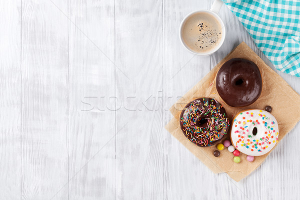 Donuts and coffee Stock photo © karandaev