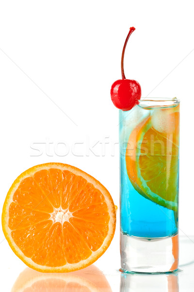 Alcohol cocktail with blue curacao, orange and maraschino Stock photo © karandaev