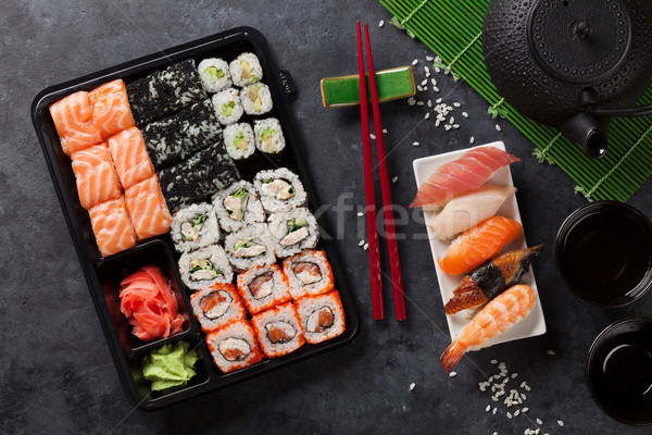 Stock photo: Set of sushi and maki roll and green tea