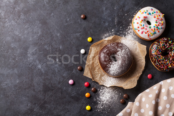 Farbenreich Donuts Süßigkeiten Stein Tabelle top Stock foto © karandaev