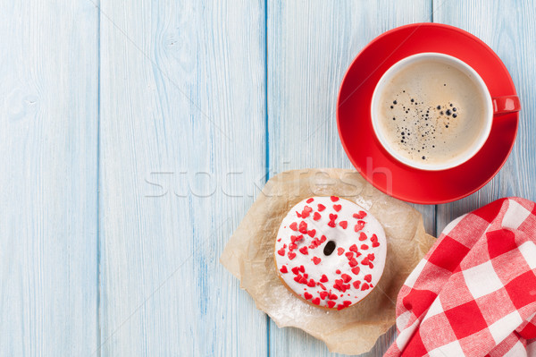 Donut with heart shaped decor and coffee Stock photo © karandaev