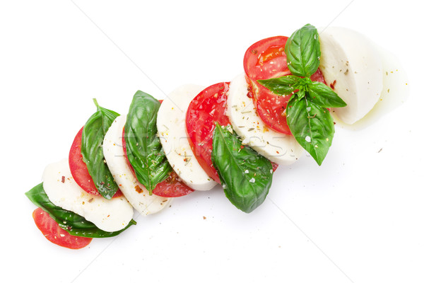 Foto d'archivio: Insalata · caprese · mozzarella · pomodori · basilico · formaggio · erbe