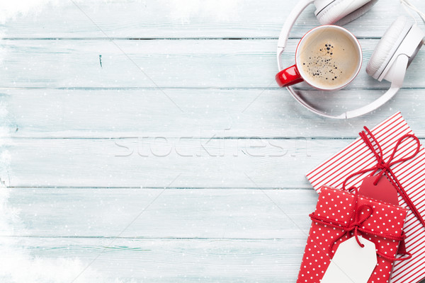 Christmas background with gifts, coffee and headphones Stock photo © karandaev