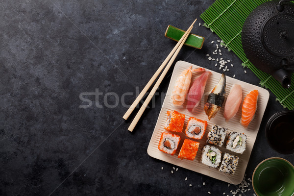 Conjunto sushi maki rolar chá verde pedra Foto stock © karandaev