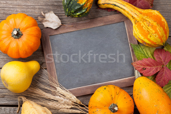 Stock photo: Autumn pumpkins on wooden table