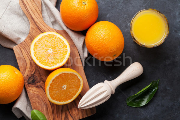Fresh orange fruits and juice Stock photo © karandaev