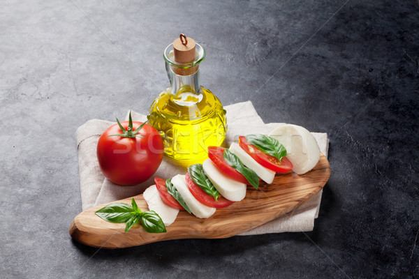 Stock photo: Caprese salad. Mozzarella, tomatoes and basil