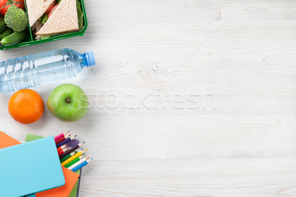 Lunch box and school supplies Stock photo © karandaev