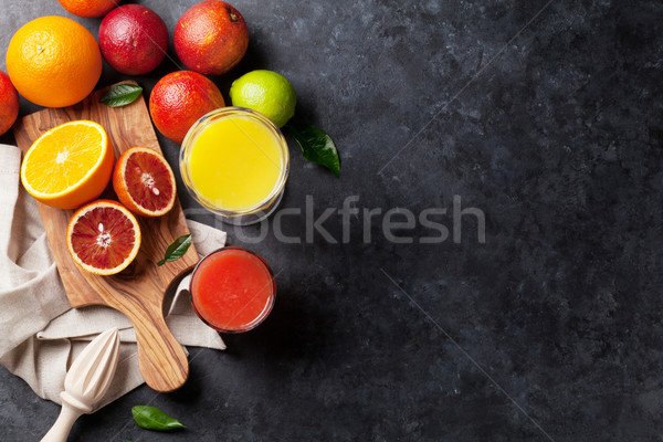 Fresh citruses and juice Stock photo © karandaev