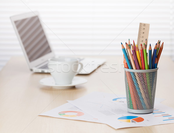 Office desk workplace with laptop, coffee and pencils Stock photo © karandaev