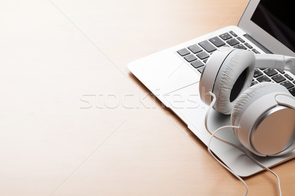 Headphones and laptop Stock photo © karandaev