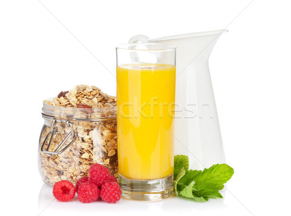 Colazione muesli frutti di bosco succo d'arancia isolato bianco Foto d'archivio © karandaev