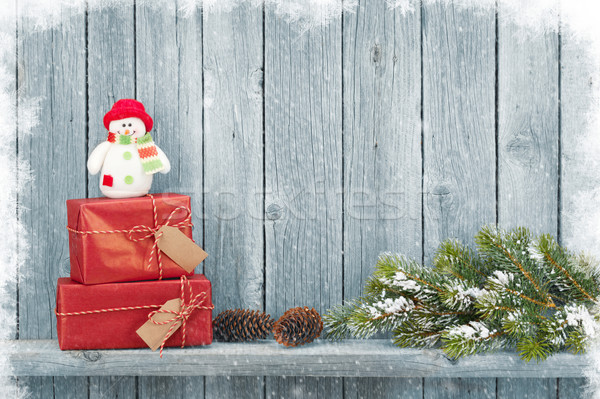 Stock photo: Christmas gift boxes and fir tree branch