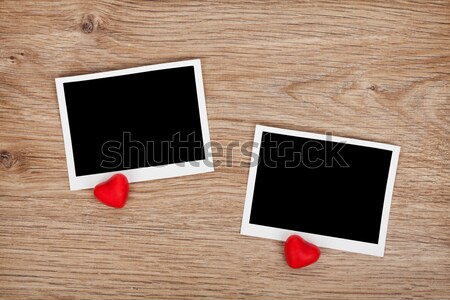 Two photo frames and small red candy hearts Stock photo © karandaev