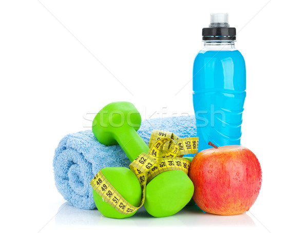 Two green dumbells, tape measure and drink bottle. Fitness and h Stock photo © karandaev