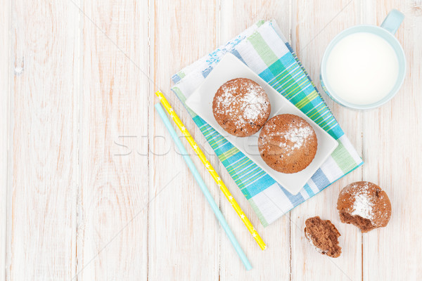 Cup of milk and cakes Stock photo © karandaev