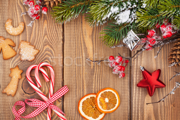 Christmas wooden background with snow fir tree and decor Stock photo © karandaev