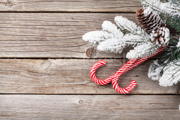 Noël bonbons canne neige table en bois [[stock_photo]] © karandaev