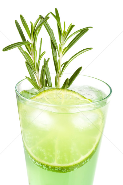 Mint Champagne alcohol cocktail with lime slice and rosemary Stock photo © karandaev