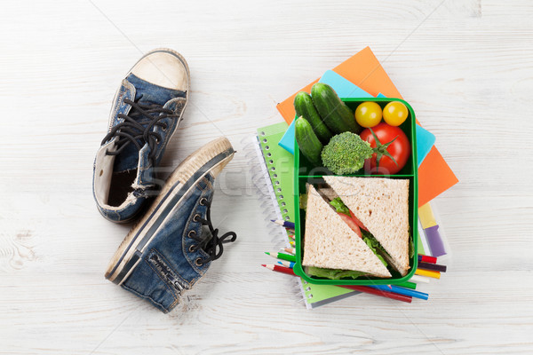 Lunch box and school supplies Stock photo © karandaev