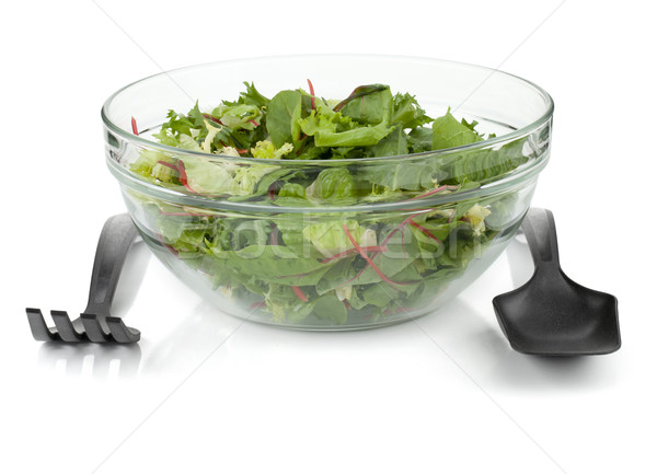 Healthy green salad with plastic utensils Stock photo © karandaev