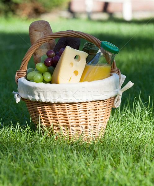 Extérieur panier pique-nique vert pelouse pain fromages [[stock_photo]] © karandaev