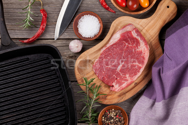 Stock photo: Raw beef steak and spices