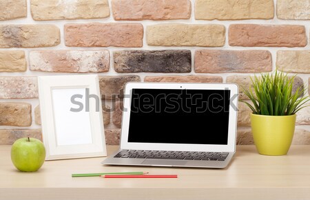 Stock photo: Office workplace with laptop and photo