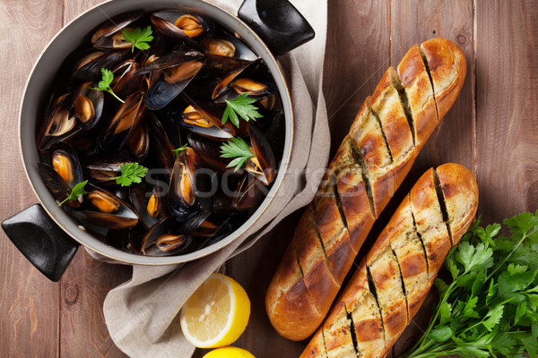 Mussels and bread Stock photo © karandaev
