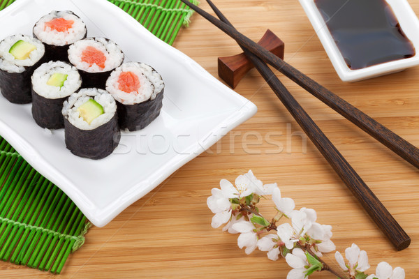 Sushi maki set and sakura branch Stock photo © karandaev